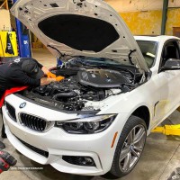 White-BMW-mechanic-shop-SL-Autoworks